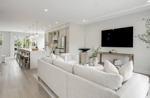 Beach Barber Tract House | Designer Luxury Coastal Home with Panoramic Ocean Views, Rooftop Deck, & Fire Pit