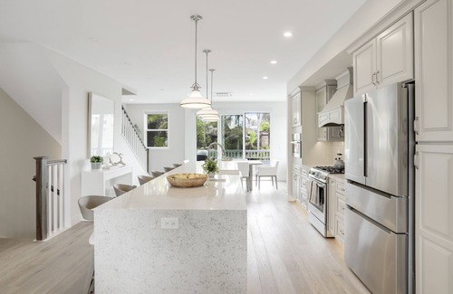 Beach Barber Tract House | Designer Luxury Coastal Home with Panoramic Ocean Views, Rooftop Deck, & Fire Pit