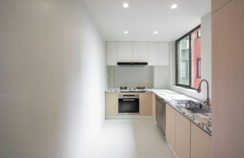 Shanghai Apartment | Designer-style, four-bedroom apartment with a large living room