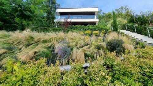 Balatonakarattya Villa | Designer Villa Above Lake Balaton & Near Water