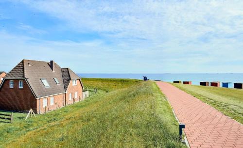 Dagebuell Apartment | Direkt am Deich - Ferienwohnung Amrum im Gästehaus Am Badedeich