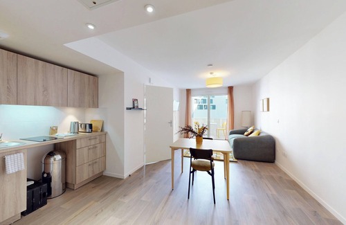 Asnieres-sur-Seine Apartment | Discover our Oya coliving near Paris. Furnished private units with shared spaces