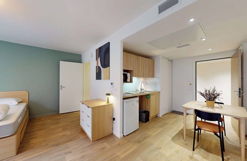 Asnieres-sur-Seine Apartment | Discover Oya near Paris – private units with shared spaces.