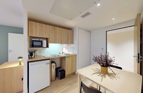 Asnieres-sur-Seine Apartment | Discover Oya near Paris – private units with shared spaces.
