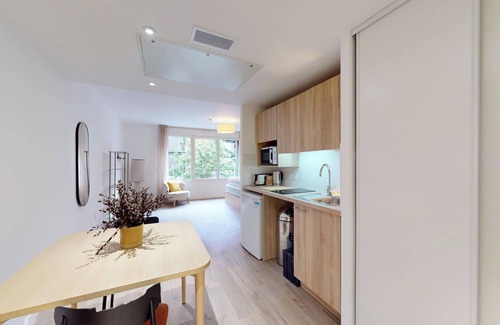 Asnieres-sur-Seine Apartment | Discover Oya near Paris – private units with shared spaces.