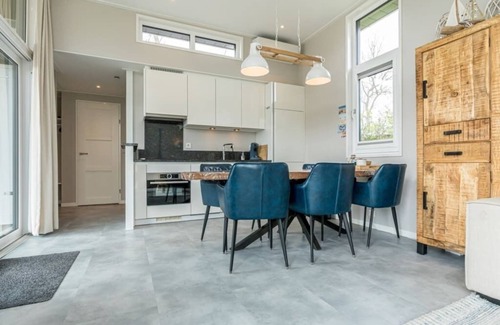 Burgh-Haamstede House | Discover this beautiful L-shaped chalet with a covered, sheltered terrace and a lovely lounge set. T