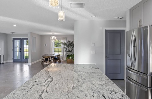 Haines City House | Disney Poolside Paradise for Relaxation, Celebration & Work