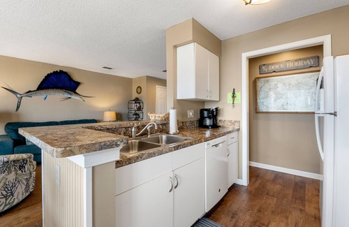 Manteo Condo | Dock Holiday: Canalfront condo, Water Views, Fisherman's dream with Boat Dock