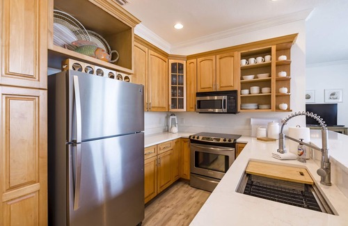 Clearwater Beach Condo | Dock of the Bay-Coastal Elegance, Water Views, Pool, Dock, Walk Everywhere!