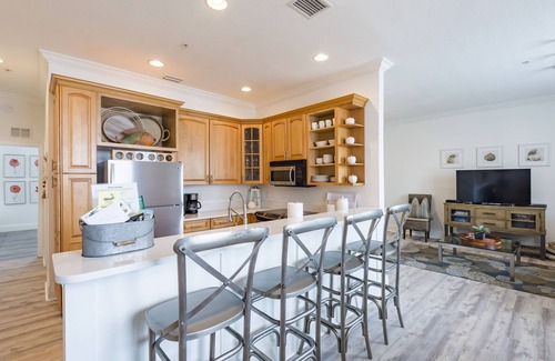Clearwater Beach Condo | Dock of the Bay-Coastal Elegance, Water Views, Pool, Dock, Walk Everywhere!