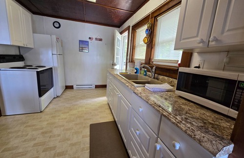 Honor House | Dog-friendly and lakefront home with firepit close to restaurants and shops
