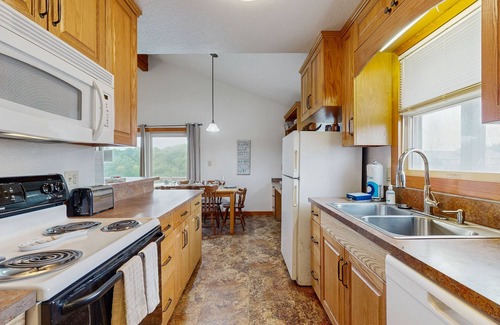 Brigands' Bay House | Dog-friendly, canal-front house with dock, balcony, deck, & central AC