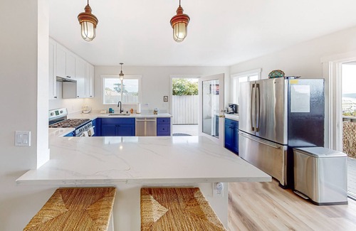 Old Town House | Dog-friendly coastal stay with large balcony, water views, & wood fireplace