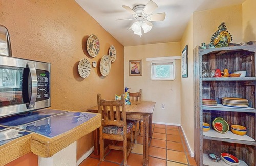Taos House | Dog-friendly getaway with a gas fireplace, full kitchen, & patio