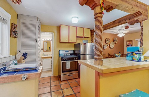 Taos House | Dog-friendly getaway with a gas fireplace, full kitchen, & patio
