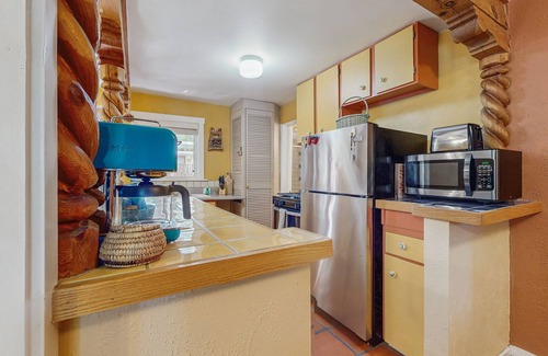Taos House | Dog-friendly getaway with a gas fireplace, full kitchen, & patio