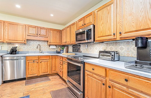 Grand Beach House | Dog-friendly home near beach with deck, grill, large backyard, wood fireplace