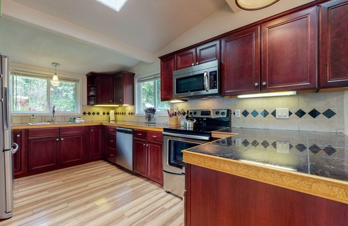 South Beach House | Dog-friendly home near the beach - private hot tub, wood-burning fireplace & W/D