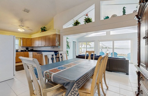 Tropical Bay Estates House | Dog-friendly home with waterfront views, a pool & Wifi