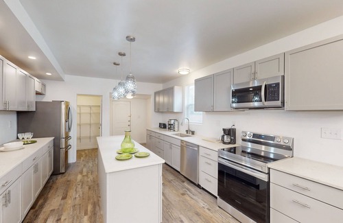 Indianapolis House | Dog-friendly home with yard, attached suite, washers & dryers, central AC