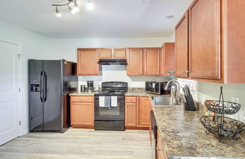 Bolivia House | Dog-Friendly Home w/Pool Access Near Oak Island!