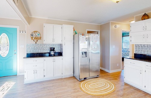 Buxton House | Dog-friendly home with private pool, firepit, fenced yard, covered patio, & deck