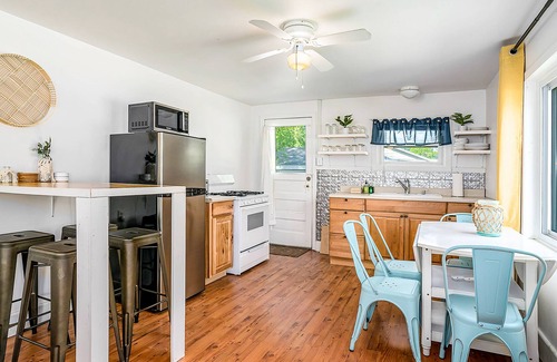 Paw Paw Lake House | Dog-friendly retreat near the lake with charming fixtures, large yard, & firepit