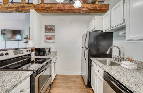 Ludlow Condo | Dog-friendly & riverfront condo one mile from Okemo with wood fireplace