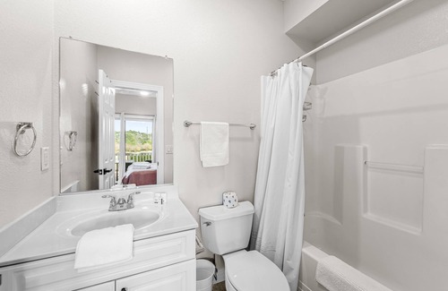 Bermuda Bay House | Dog-friendly townhouse with private hot tub, game room, pool, gym, & beach gear
