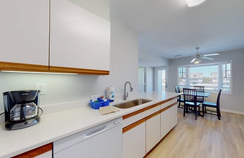 Buxton House | Dog-friendly townhouse with pool access, W/D, AC & ocean views - walk to beach