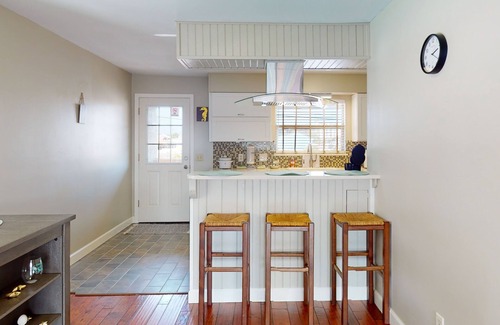 Holiday Beach House | Dog-friendly condo with pool, balcony, beach access, central AC, & W/D