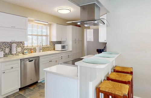 Holiday Beach House | Dog-friendly condo with pool, balcony, beach access, central AC, & W/D