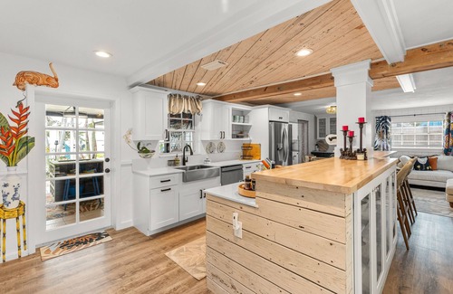 Bay Point House | Dog-friendly waterfront home with outdoor kitchen, bar, firepit, & kayak launch