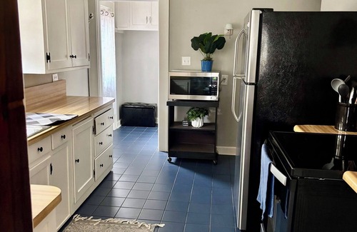 Bedford House | Downtown Bedford’s Timeless Retreat: Historic charm meets modern living.