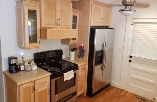 Brevard House | Downtown Cottage on the Creek. Beautiful, Natural Yard. Easy Walk to Parks.