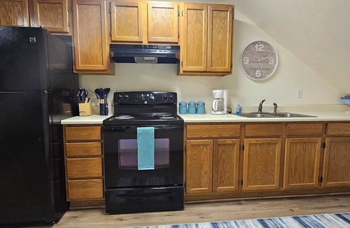 Oscoda Apartment | Downtown Digs - upstairs apartment in the heart of downtown Oscoda!