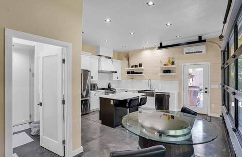 Pleasant Hill Apartment | Dramatic and Unique Industrial Door Blurs The Boundaries Between Inside and Out