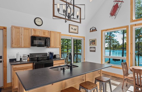 Eagle River House | Driftwood Cabin | Newer lakefront cabin, dock, firepit, kayaks, Dogs OK, AC
