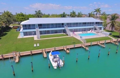Isles of Capri Condo | Driftwood Landing (1-Bedroom Condo) with Pool by RedAwning