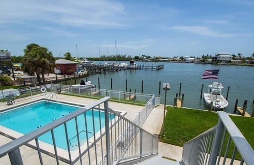 Isles of Capri Condo | Driftwood Landing (1-Bedroom Condo) with Pool by RedAwning