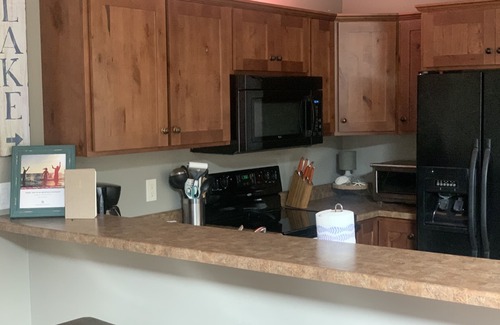 Spirit Lake Cabin | Drop your anchor at this cozy, well-appointed home with one-of-a-kind features.