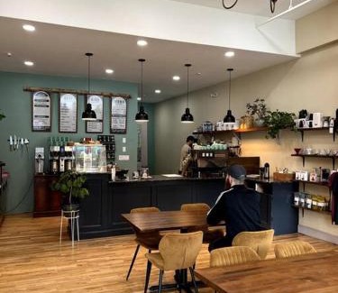 Bangor Apartment | DTWN Bangor, Historic Hotel, Coffee Shop in building, Room # 105