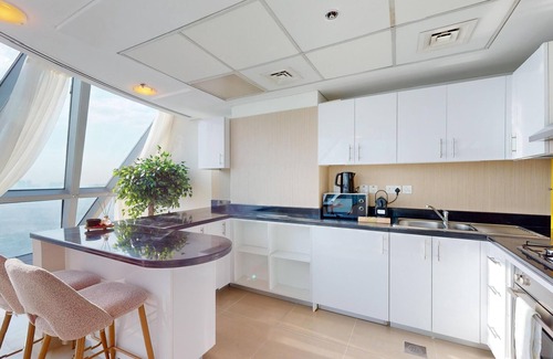 Trade Center Apartment | Duplex 2-bedroom apartment with its unparalleled retail, entertainment