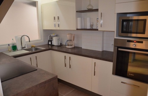 Saint-Cast-le-Guildo Apartment | Duplex apartment close to the beach and golf. Free WIFI.