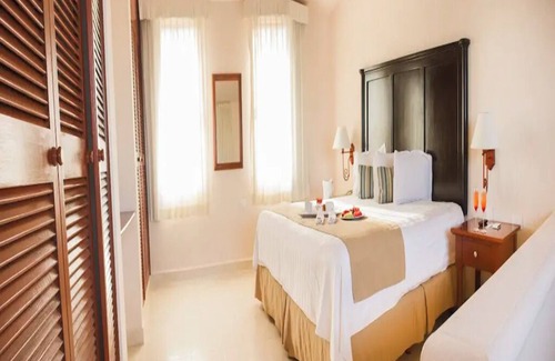 Puerto Juarez Resort | Duplex-Style Ocean View Studio with Balcony at Family Friendly Cancun Resort
