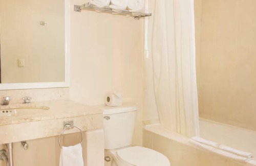 Puerto Juarez Resort | Duplex-Style Ocean View Studio with Balcony at Family Friendly Cancun Resort