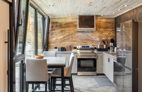 Nederland House | Earth-Built Cabin with Pine Shadows and a Tub That Waits