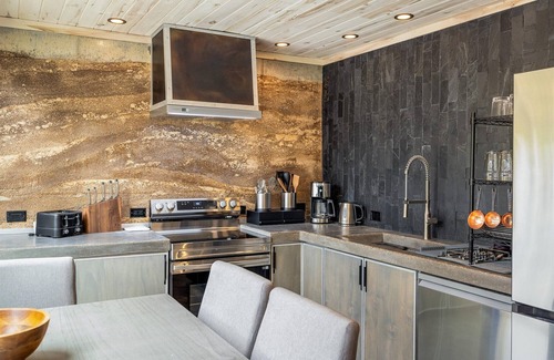 Nederland House | Earth-Built Cabin with Pine Shadows and a Tub That Waits