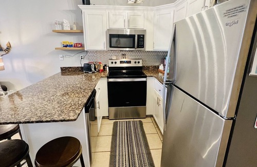 Gulfport House | Easy beach access, pool, private hot tub, family sized 3 BR townhome