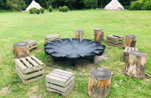 Guisborough RV Rental | Eclipse, a furnished canvas bell tent in field and woodland surroundings